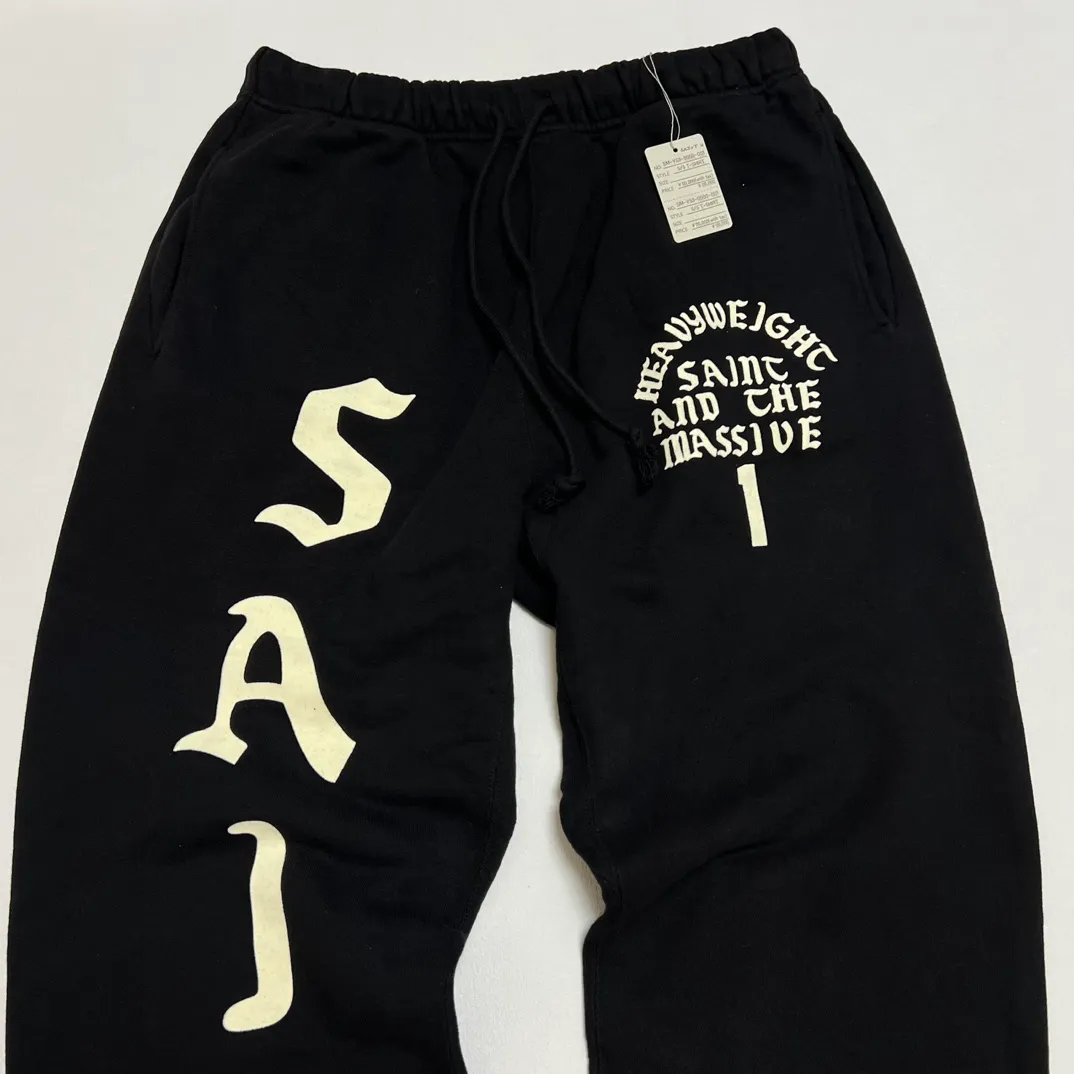 SAINT Mxxxxxx SWT PNT/IT'S SAINT/BLK flocked sweatpants black S-X ⚠️Attention: important points: this is flocking printing, not glue or crack paste. Don't buy what you see in the picture. Electrostatic flocking printing technology. Correct accessories. Fruit main mark/little angel anti-counterfeiting mark.